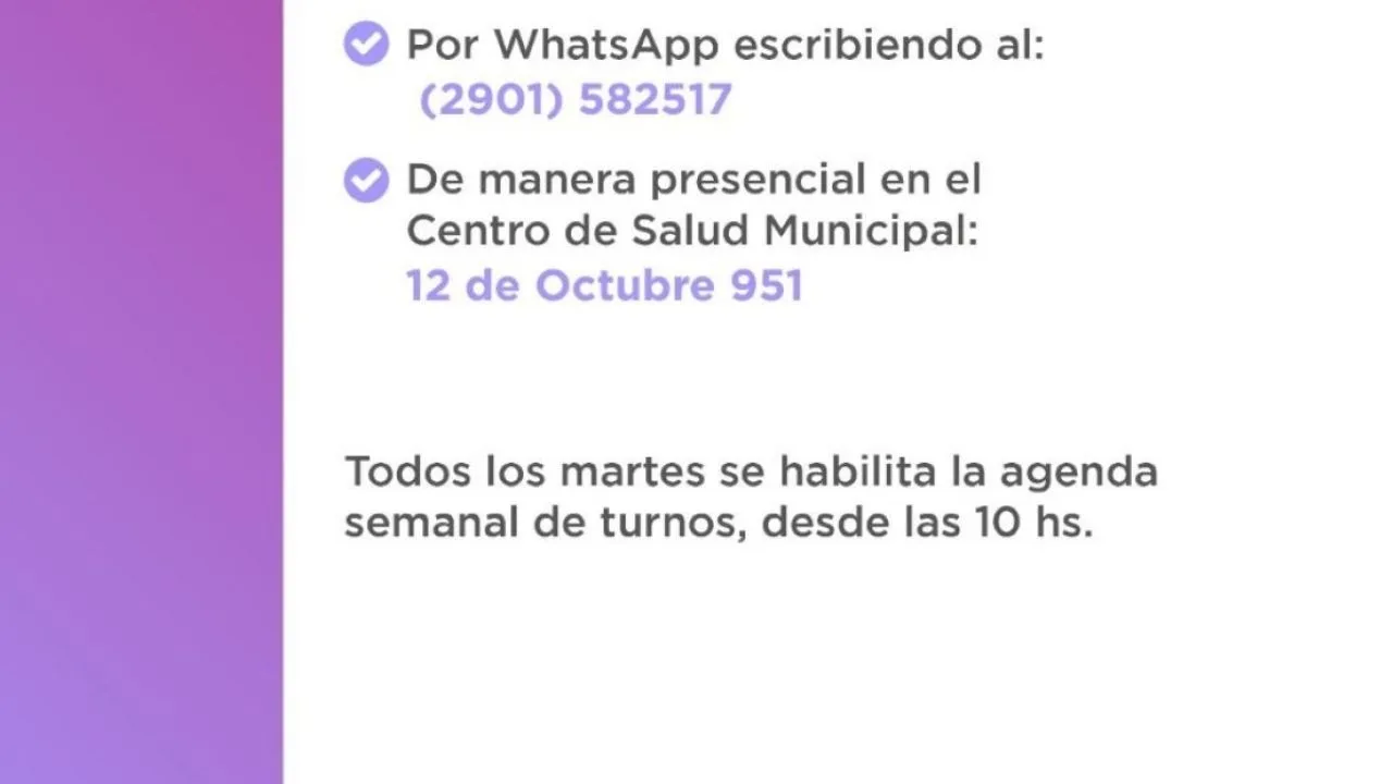 Edificio del Centro de Salud Municipal de Ushuaia con cartel de atención al público